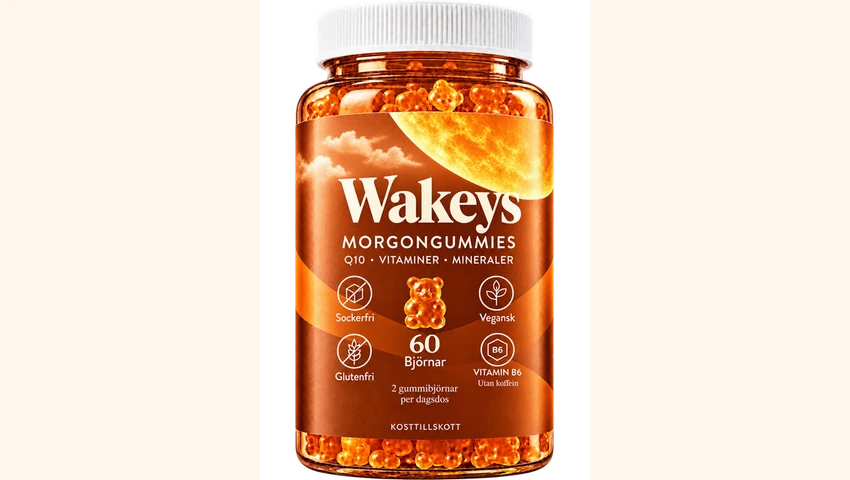 En burk Wakeys morgongummies med vit kork och orange etikett